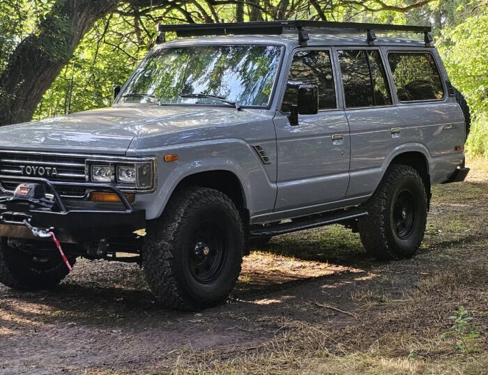 1988 Toyota FJ62 Land Cruiser LS3 restomod in gray with Front Runner roof rack
