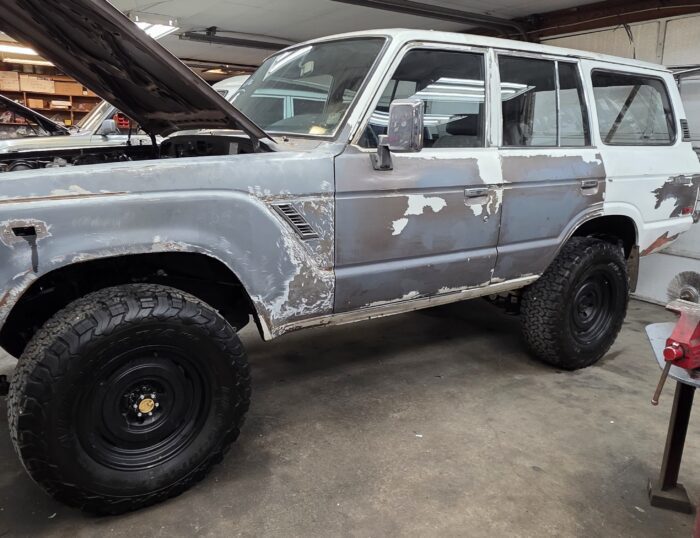 Driver side profile of 1987 Toyota Land Cruiser FJ60 awaiting restoration