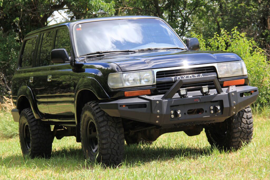 1990 Toyota HDJ80 turbo diesel Land Cruiser in Midnight Black with custom front bumper restored by Land Cruiser Restorations
