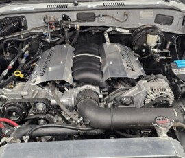Custom Toyota Land Cruiser LS3 V8 engine with billet aluminum Land Cruiser engine cover