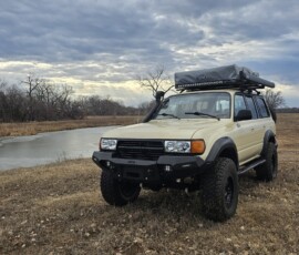 Custom FJ80 Toyota Land Cruiser with roof top tent and snorkel