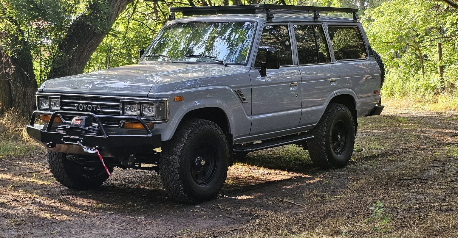 1988 Toyota FJ62 Land Cruiser LS3 restomod in gray with Front Runner roof rack